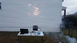 Thriller Projector on side of the house.jpg