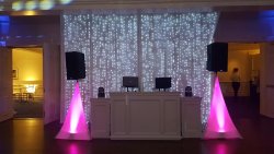 White thick facade with scrims at a wedding DJ Ricky.jpg